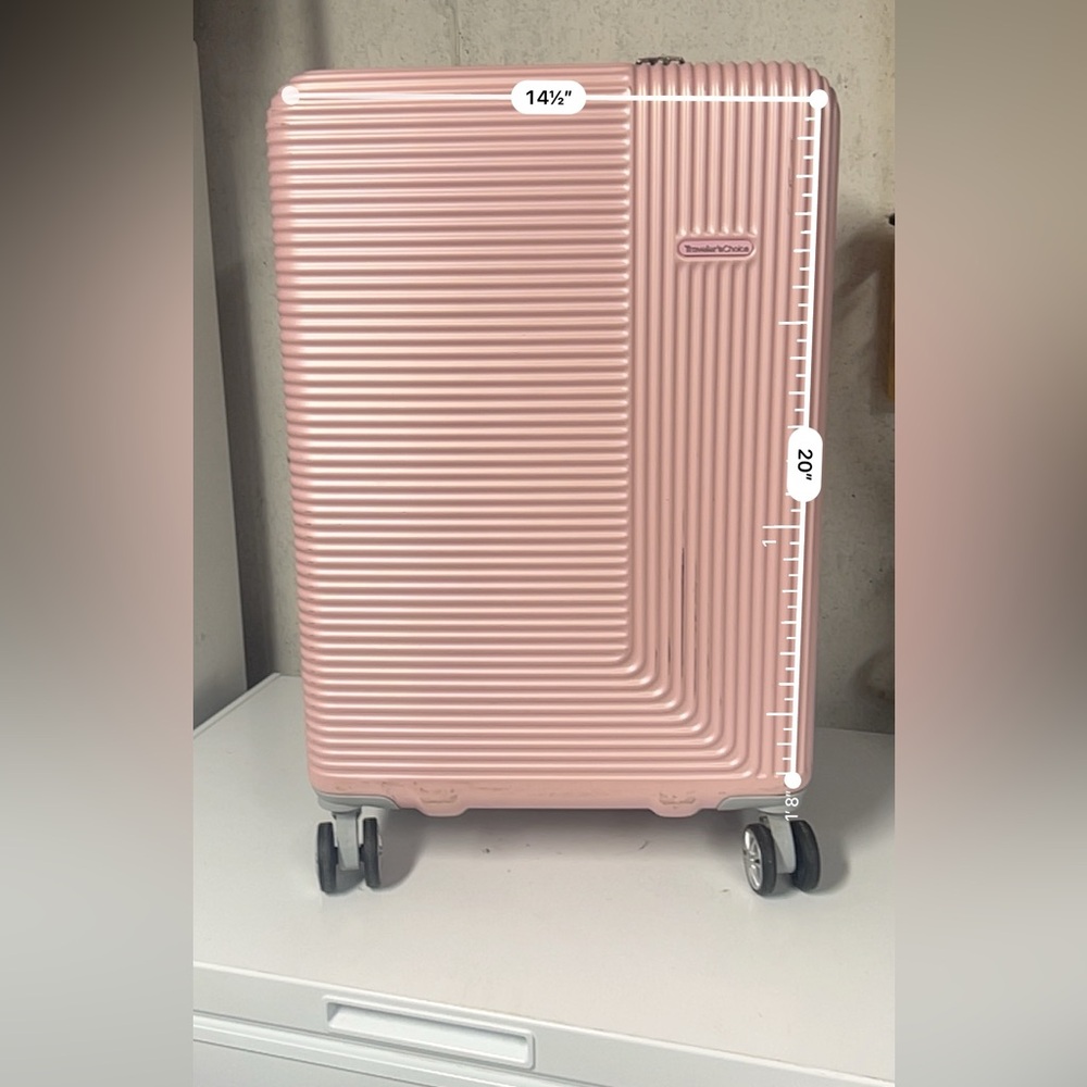 Travelers choice rolling luggage bag